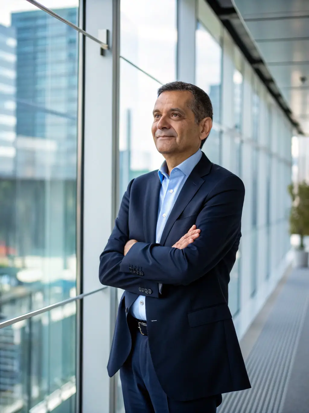 A professional photograph of Howard Dargan, the founder, in a modern office setting, exuding confidence and expertise.